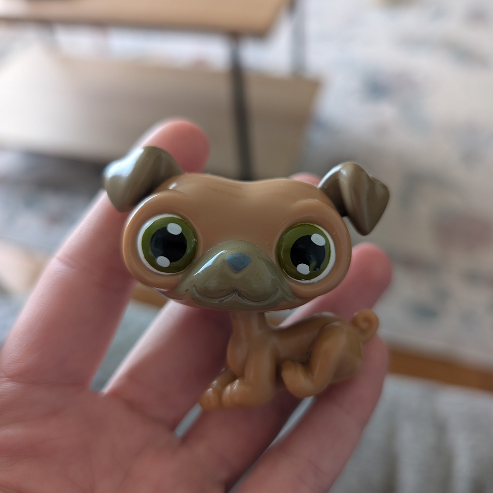Cute Brown and Green-Eyed Toy Figure